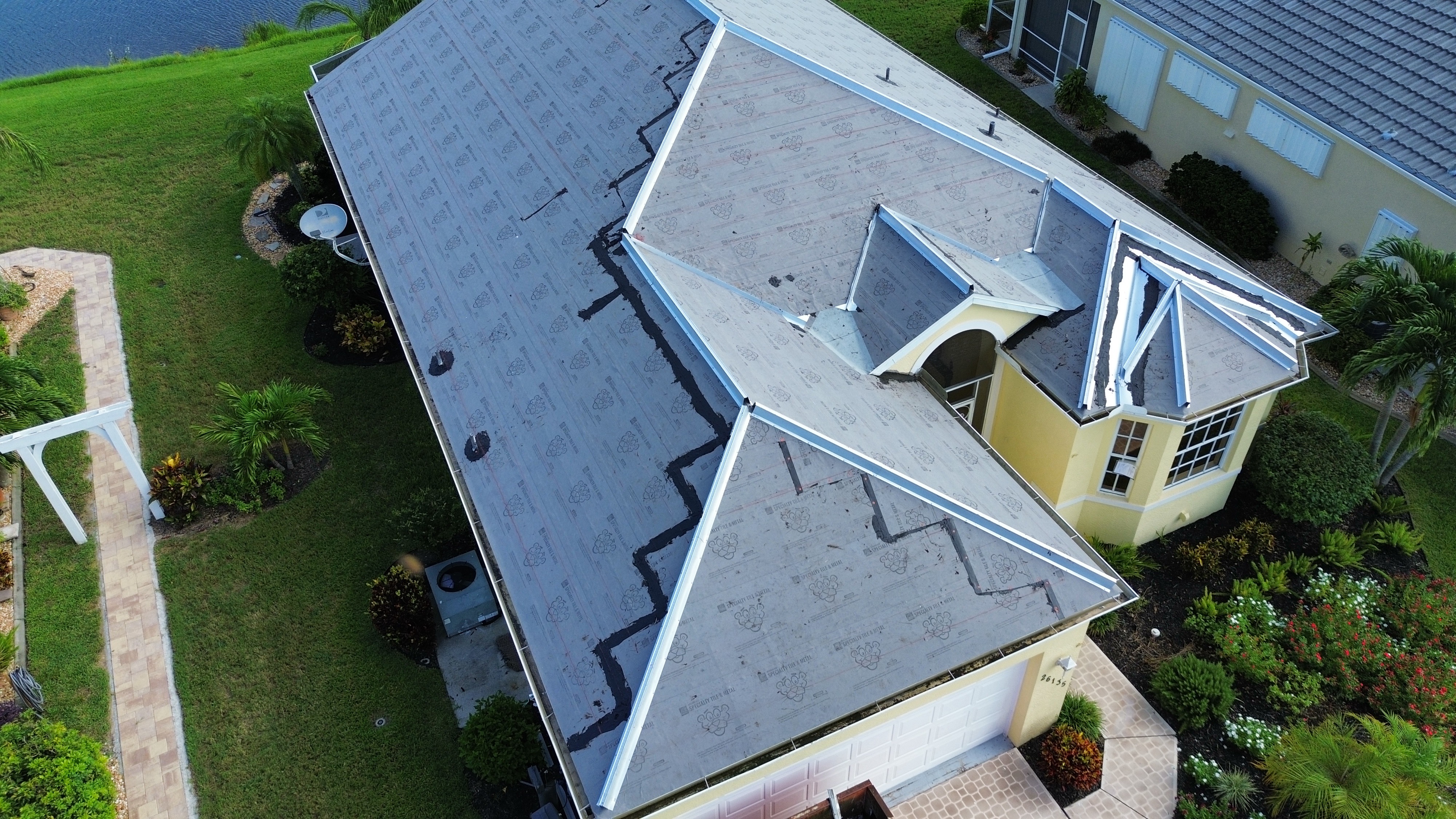 Synthetic underlayment and drip edge on complex hip roof Cape Coral