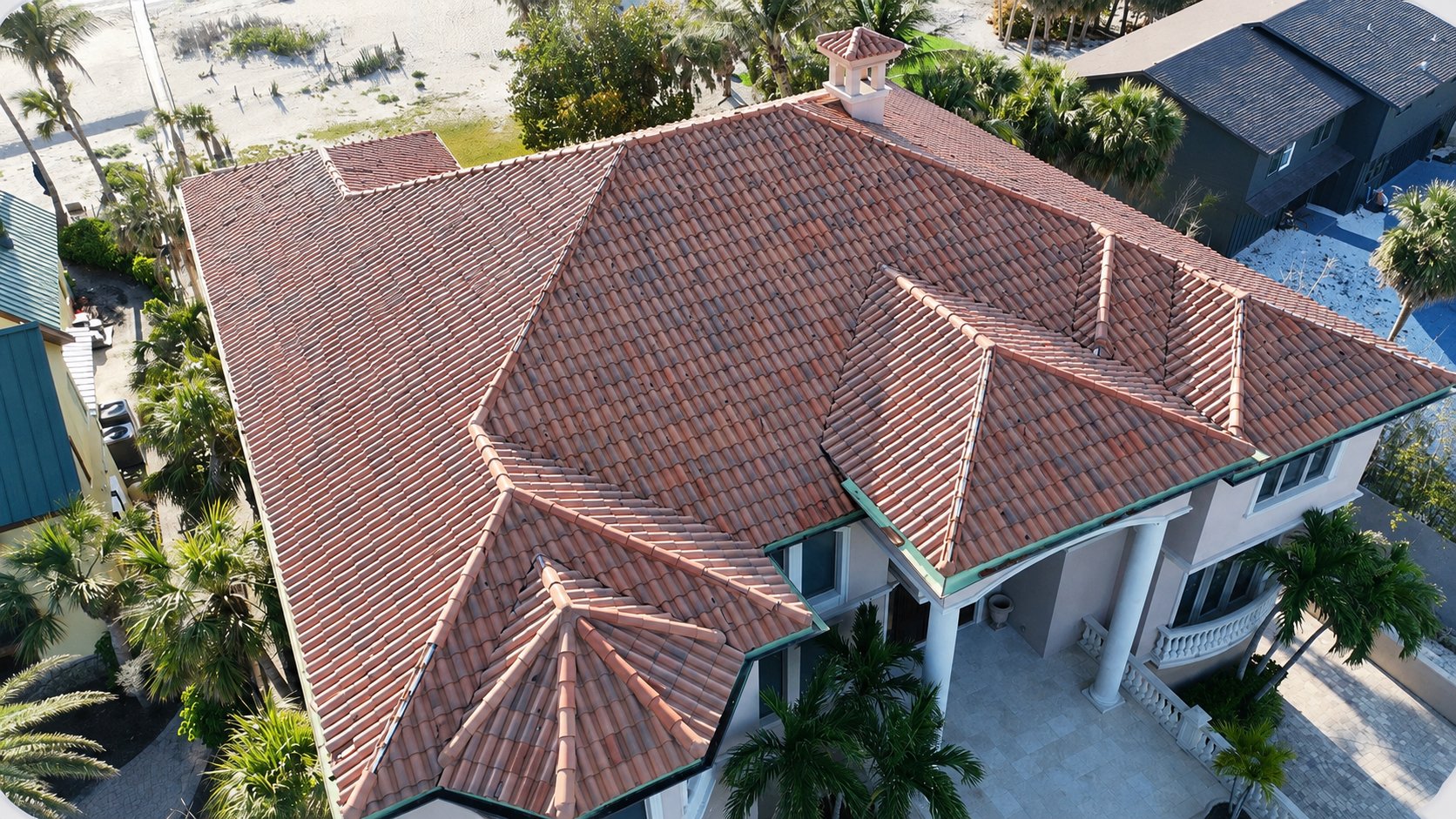 After: the same barrel tile roof repaired back to pre-storm condition
